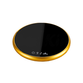 A drink warmer with a black and gold color scheme, displaying digital information on its surface.